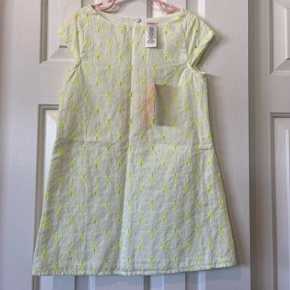 Girls size 6 white with yellow design dress from Gymboree, NWT